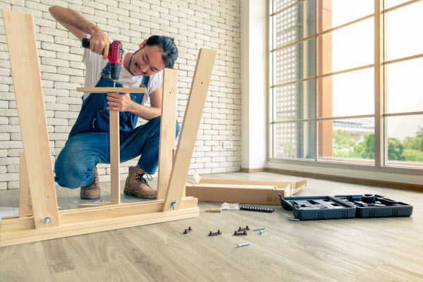 Handyman Assemblying Flat Pack Desk